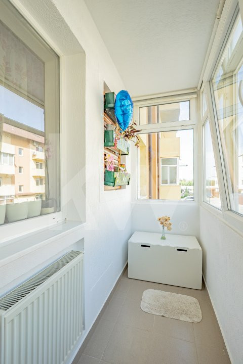 Apartament luminos cu 2 camere, etaj 1, parcare și loc de joacă privat