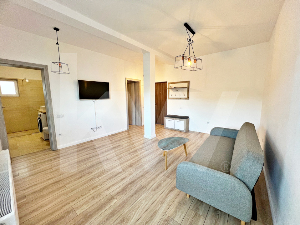 Apartament primitor de 2 camere, mobilat și utilat + balcon si parcare. Parter.