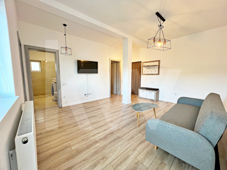 Apartament primitor de 2 camere, mobilat și utilat + balcon si parcare. Parter.