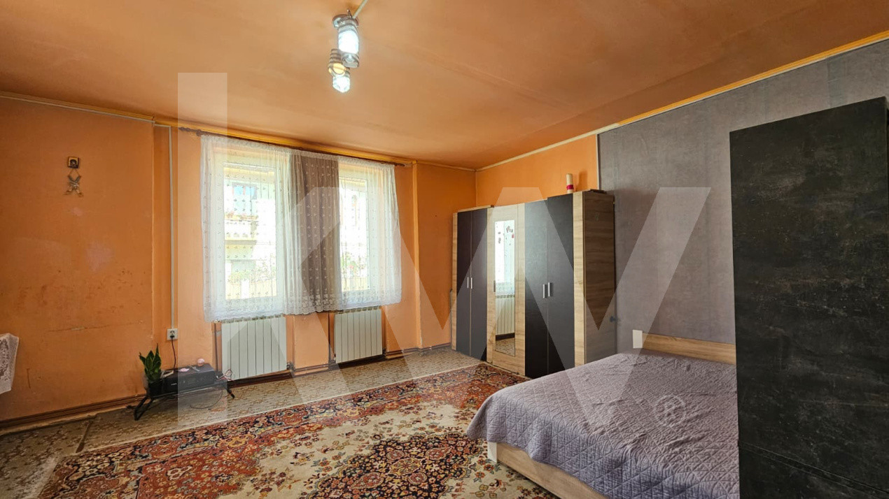 Casă individuală compusă din două apartamente, cu teren liber de 540 mp 