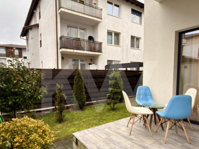 Apartament la parter cu curte privată, terase și două locuri de parcare