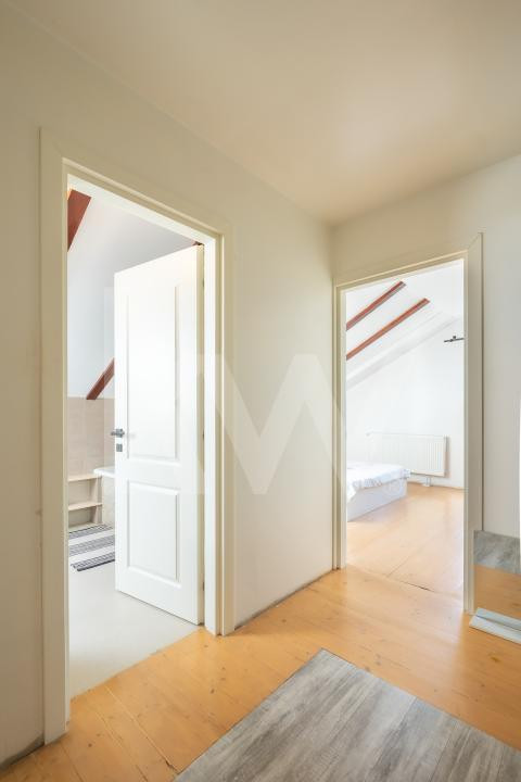 Apartament cu 3 camere, pod amenajat și 2 locuri de parcare
