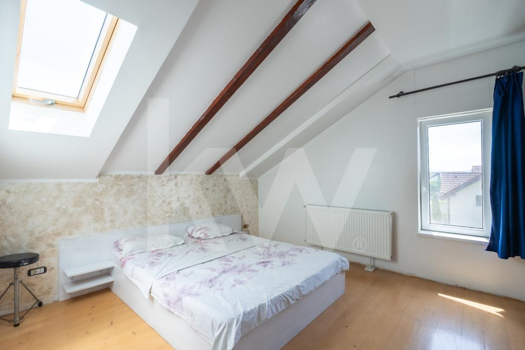 Apartament cu 3 camere, pod amenajat și 2 locuri de parcare