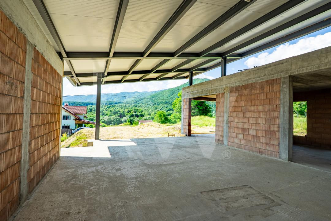 Casă cu arhitectură modernă si teren  in Cisnădioara