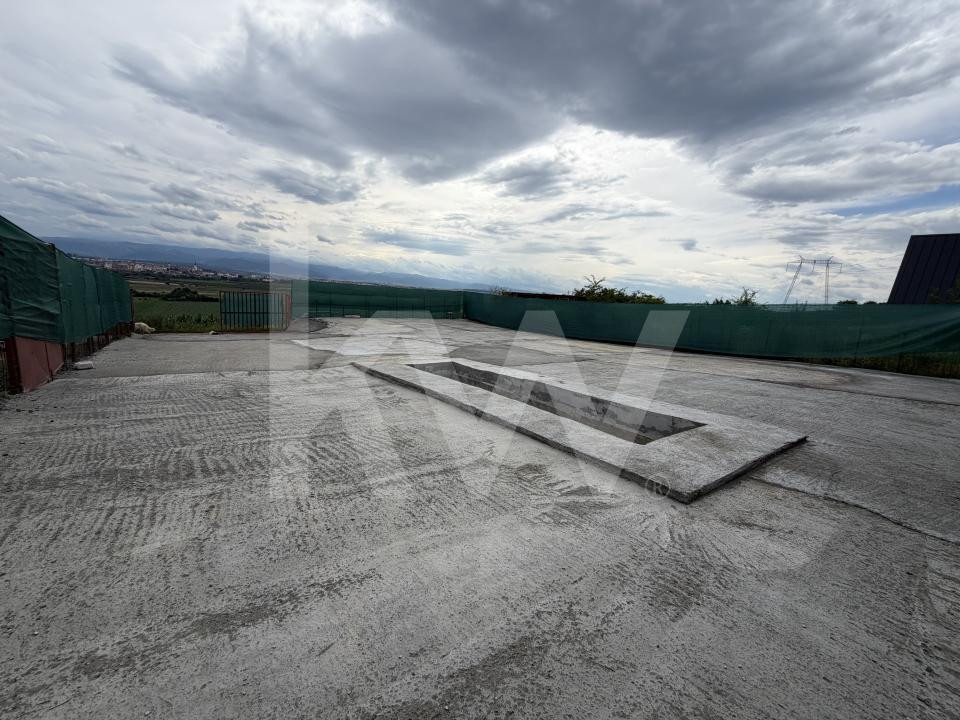 Teren betonat 382 mp cu groapă de vizitare – de închiriat 