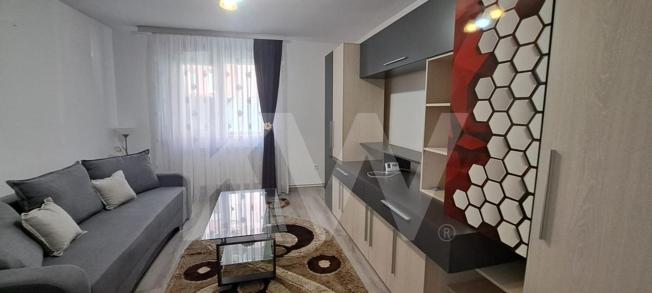Apartament modern cu 2 camere, curte privată și 2 locuri de parcare