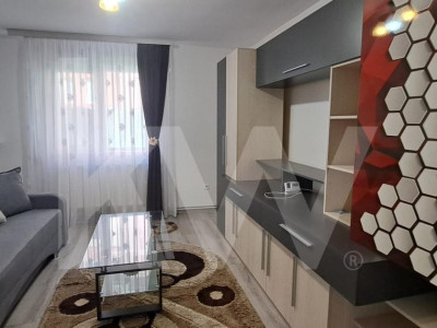 Apartament modern cu 2 camere, curte privată și 2 locuri de parcare