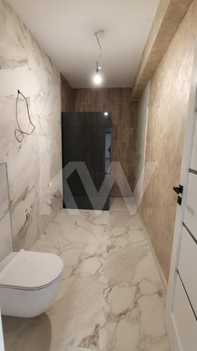 Apartament doua camere, bucatarie separata, decomandat