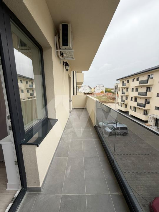 Apartament modern de 63 mp, cu 2 dormitoare și loc de parcare