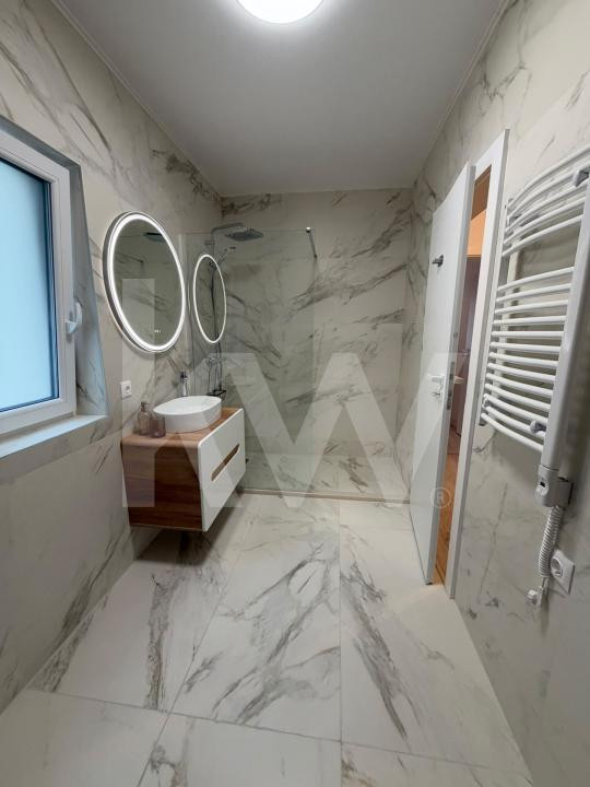 Apartament modern de 63 mp, cu 2 dormitoare și loc de parcare