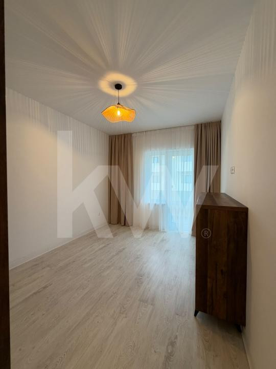 Apartament modern de 63 mp, cu 2 dormitoare și loc de parcare