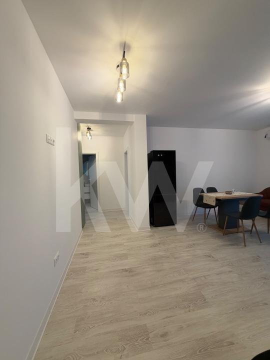 Apartament modern de 63 mp, cu 2 dormitoare și loc de parcare